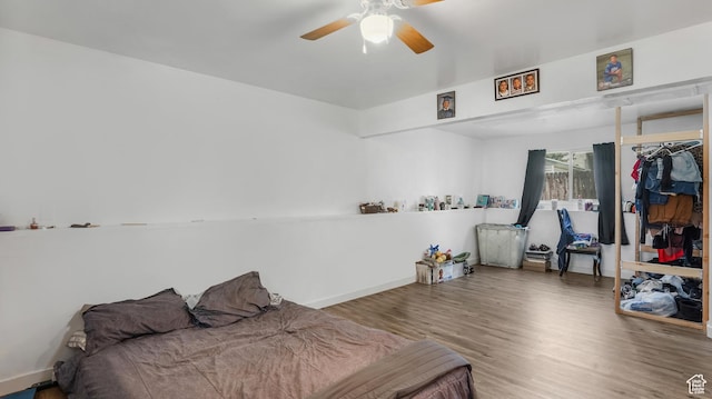 636 Downs Dr, Ogden, UT 84404 - bedroom with wood finished floors and ceiling fan
