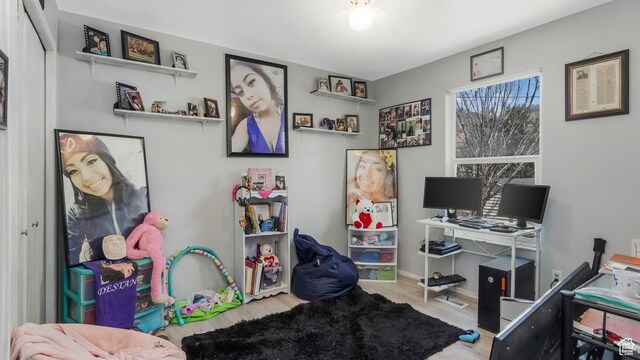 636 Downs Dr, Ogden, UT 84404 - home office with wood finished floors and baseboards