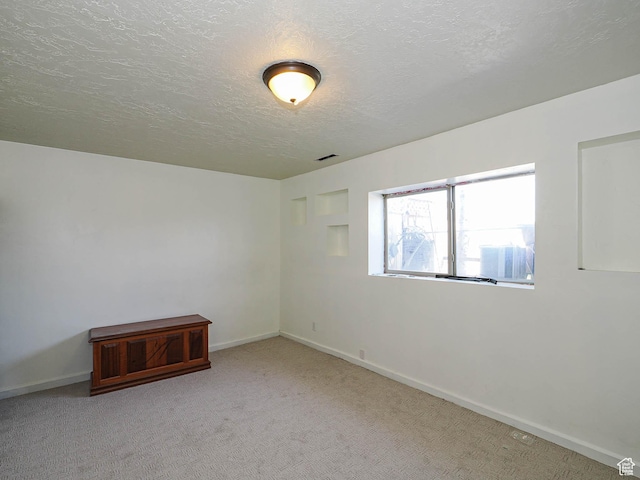 12615 S Dunhammer Dr, Riverton, UT 84065 - spare room with light carpet and a textured ceiling