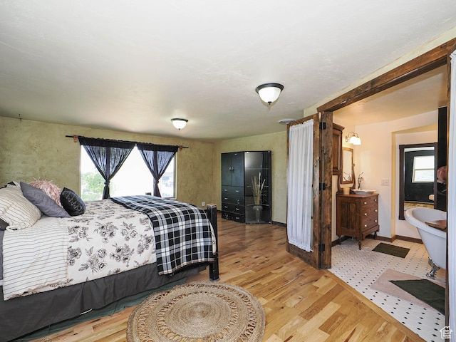 12615 S Dunhammer Dr, Riverton, UT 84065 - bedroom featuring light wood-style floors and baseboards
