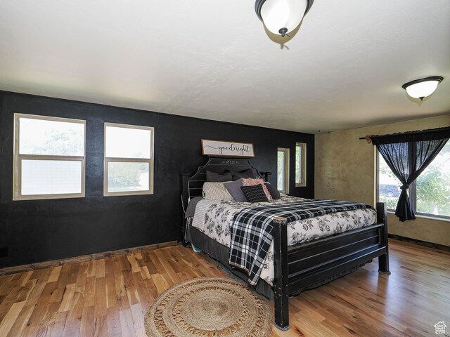 12615 S Dunhammer Dr, Riverton, UT 84065 - bedroom with wood finished floors and baseboards