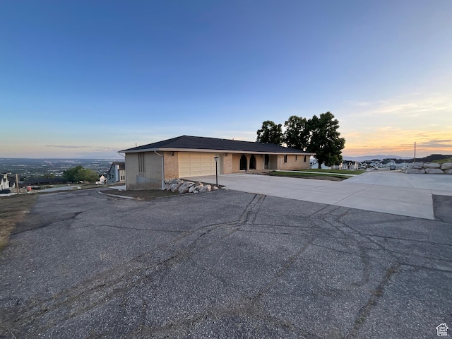 3696 N 475 E, North Ogden, UT 84414 - view of front of property with an attached garage, driveway, and brick siding