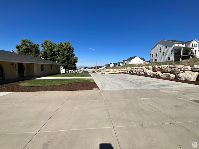 3696 N 475 E, North Ogden, UT 84414 - view of concrete surface with a residential view