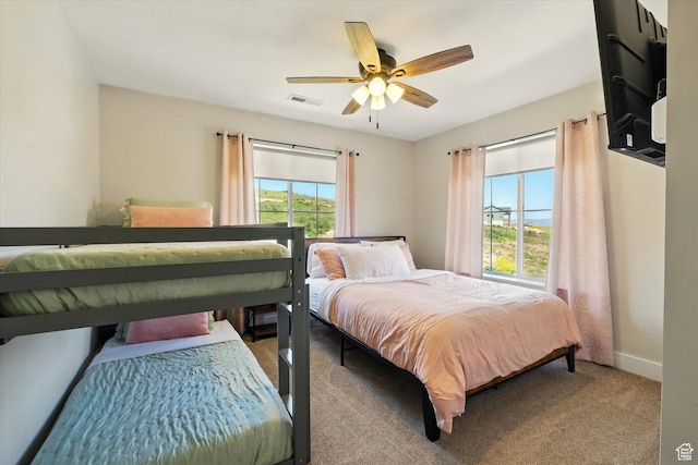 689 W Dee Dr, Garden City, UT 84028 - bedroom with carpet flooring and a ceiling fan