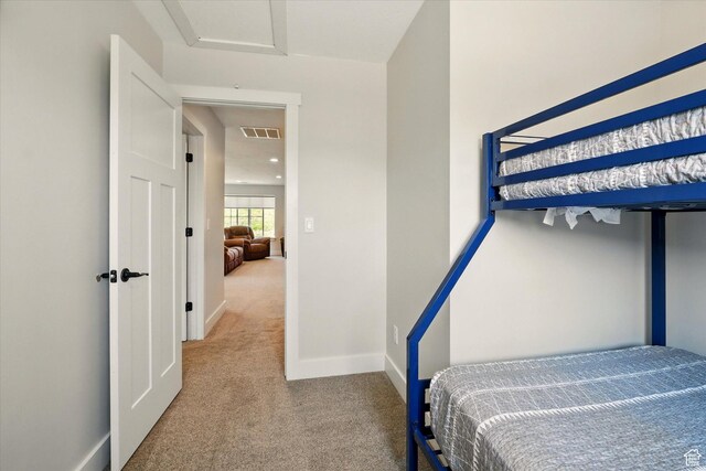 689 W Dee Dr, Garden City, UT 84028 - bedroom featuring carpet floors and attic access