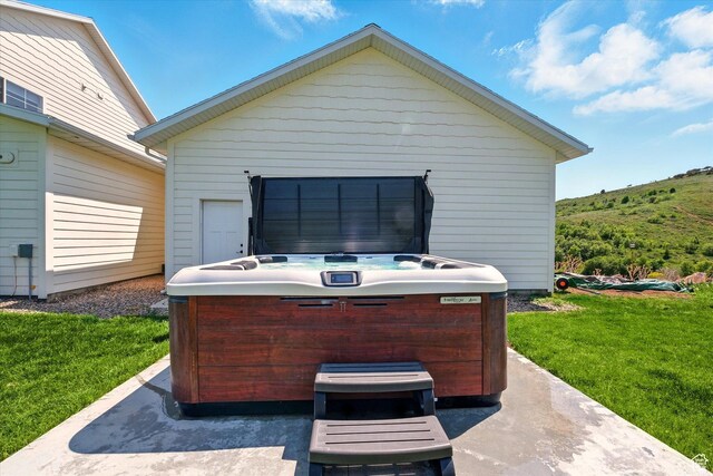 689 W Dee Dr, Garden City, UT 84028 - view of patio featuring a hot tub