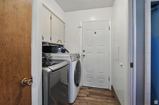 572 W 300 N, Hyrum, UT 84319 - washroom featuring cabinet space, dark wood-style flooring, and washer and clothes dryer