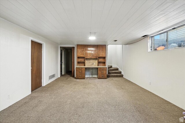 572 W 300 N, Hyrum, UT 84319 - unfurnished living room with light colored carpet and stairs