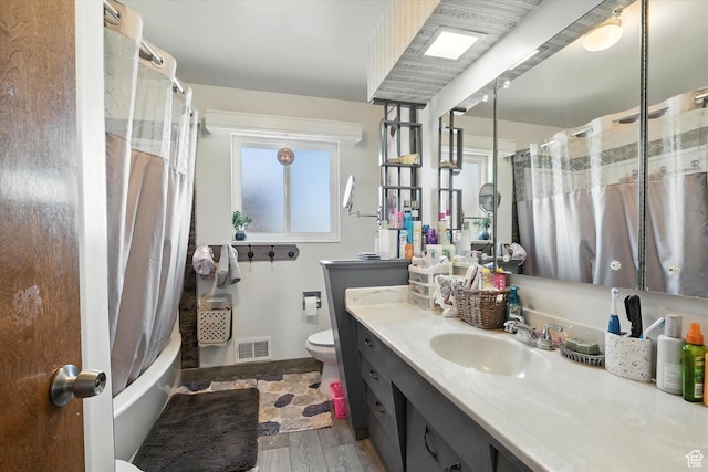 572 W 300 N, Hyrum, UT 84319 - bathroom with vanity, wood finished floors, and shower / bath combination with curtain