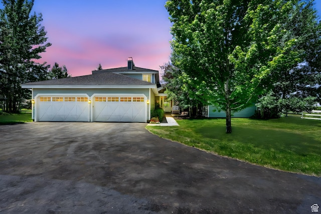2125 E Elk Meadow Cir, Kamas, UT 84036 - view of front of house with a yard and asphalt driveway