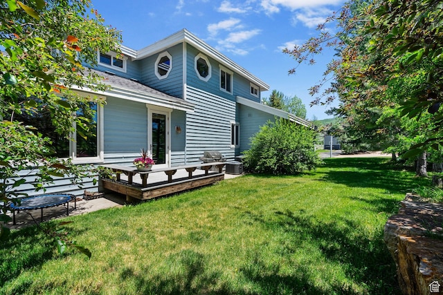 2125 E Elk Meadow Cir, Kamas, UT 84036 - rear view of house with a yard, a wooden deck, and a shingled roof