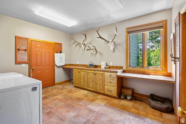 2125 E Elk Meadow Cir, Kamas, UT 84036 - laundry room featuring cabinet space, separate washer and dryer, and an office area