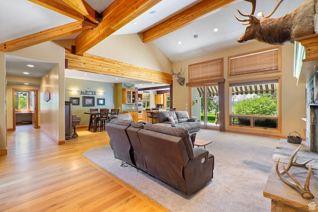 2125 E Elk Meadow Cir, Kamas, UT 84036 - living room featuring beamed ceiling, high vaulted ceiling, recessed lighting, and light wood-type flooring