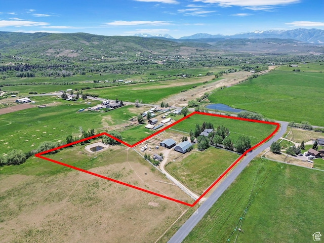 2125 E Elk Meadow Cir, Kamas, UT 84036 - aerial view of sparsely populated area with a mountain backdrop and property boundaries highlighted