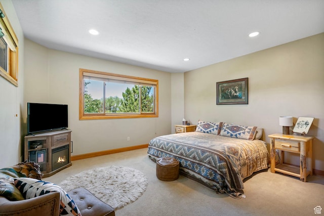 2125 E Elk Meadow Cir, Kamas, UT 84036 - bedroom featuring carpet flooring, recessed lighting, and a glass covered fireplace