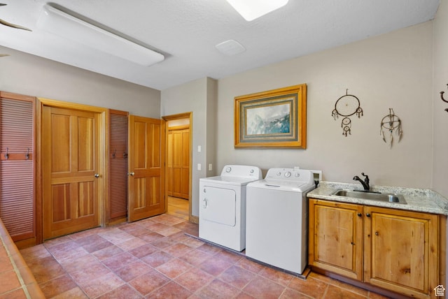 2125 E Elk Meadow Cir, Kamas, UT 84036 - laundry area with cabinet space, washer and clothes dryer, and a textured ceiling