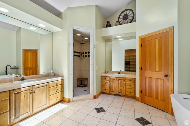 2125 E Elk Meadow Cir, Kamas, UT 84036 - bathroom featuring a shower stall, two vanities, tile patterned flooring, a soaking tub, and high vaulted ceiling