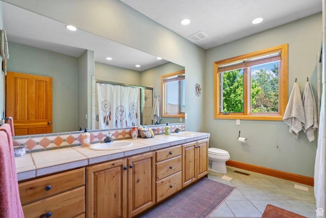 2125 E Elk Meadow Cir, Kamas, UT 84036 - bathroom with a shower with shower curtain, double vanity, tile patterned floors, and recessed lighting