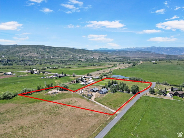 2125 E Elk Meadow Cir, Kamas, UT 84036 - aerial view of sparsely populated area featuring a mountain backdrop and property boundaries highlighted