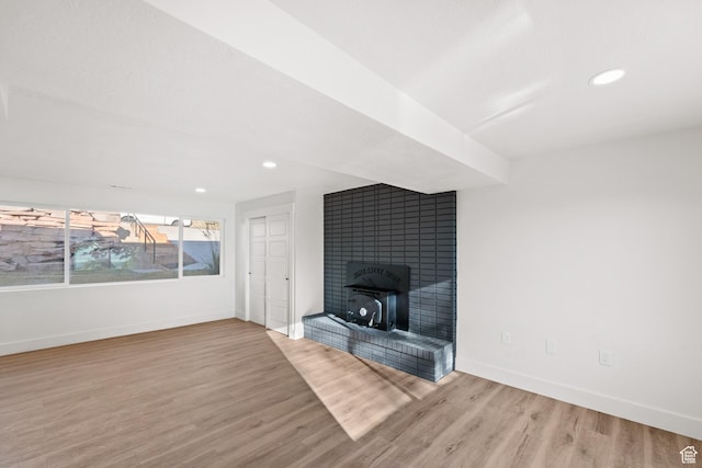 10 S 1400 E, Pleasant Grove, UT 84062 - unfurnished living room featuring light wood-style floors, recessed lighting, and a large fireplace