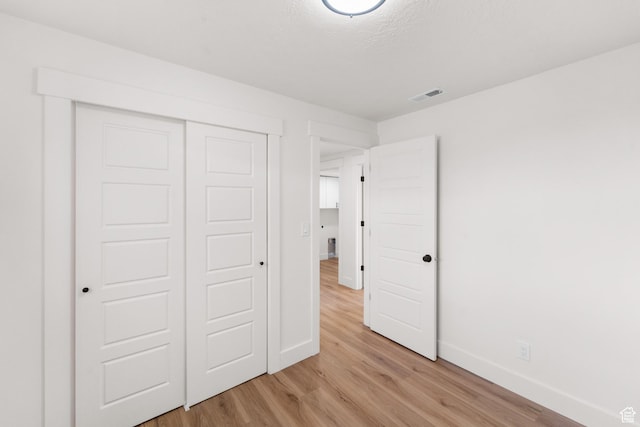 10 S 1400 E, Pleasant Grove, UT 84062 - unfurnished bedroom with light wood-type flooring and a closet