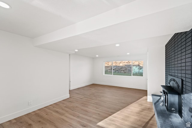 10 S 1400 E, Pleasant Grove, UT 84062 - unfurnished living room featuring wood finished floors, recessed lighting, and a fireplace