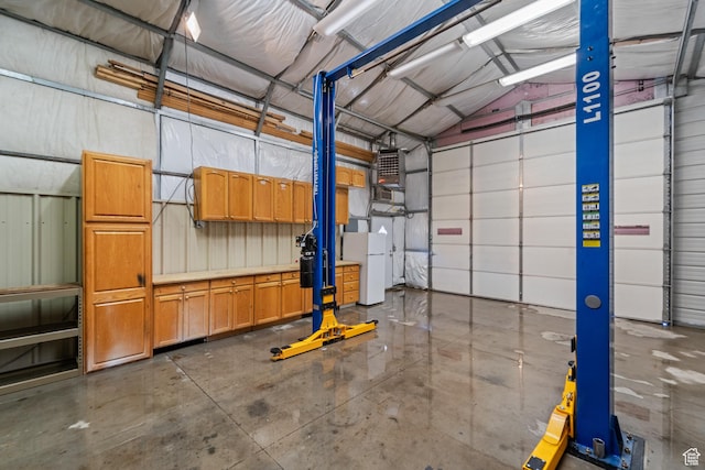 10 S 1400 E, Pleasant Grove, UT 84062 - garage featuring freestanding refrigerator