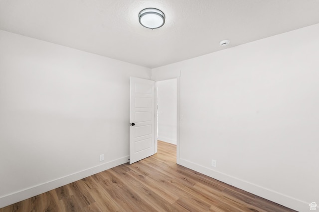 10 S 1400 E, Pleasant Grove, UT 84062 - spare room featuring light wood-style flooring and a smoke detector
