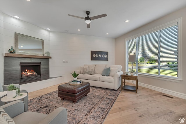 4067 W View Pointe Dr N, Highland, UT 84003 - living area featuring a ceiling fan, recessed lighting, wood finished floors, and a lit fireplace