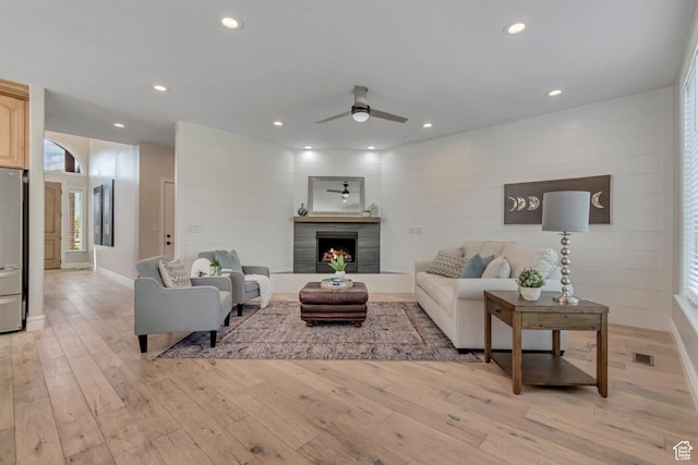 4067 W View Pointe Dr N, Highland, UT 84003 - living room with a ceiling fan, light wood-style flooring, recessed lighting, and a tiled fireplace
