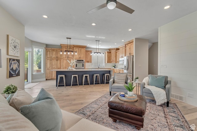 4067 W View Pointe Dr N, Highland, UT 84003 - living area featuring recessed lighting, light wood-type flooring, and a ceiling fan