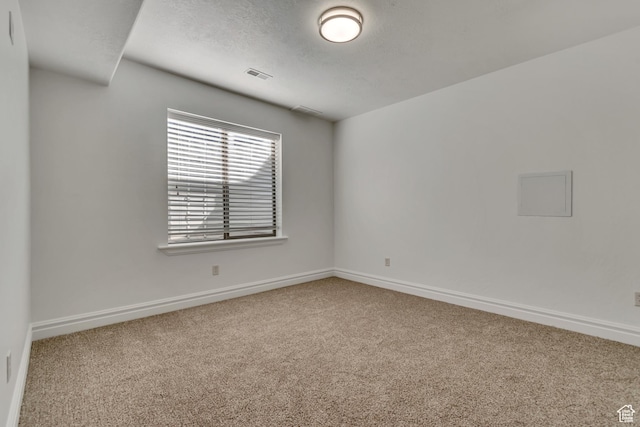 4067 W View Pointe Dr N, Highland, UT 84003 - carpeted spare room with baseboards and a textured ceiling
