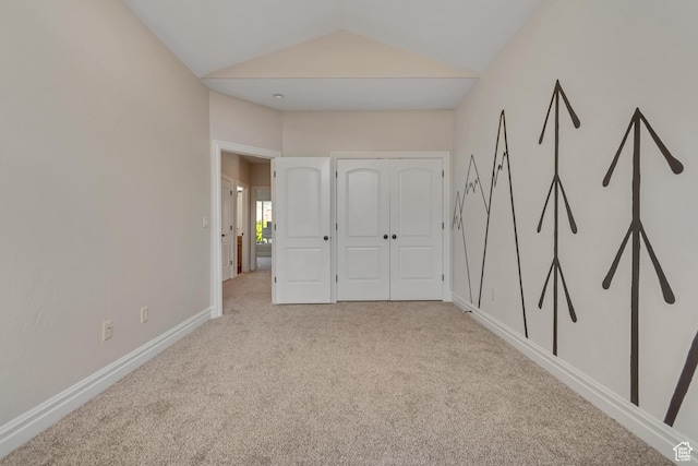 4067 W View Pointe Dr N, Highland, UT 84003 - unfurnished bedroom featuring light carpet, vaulted ceiling, and a closet