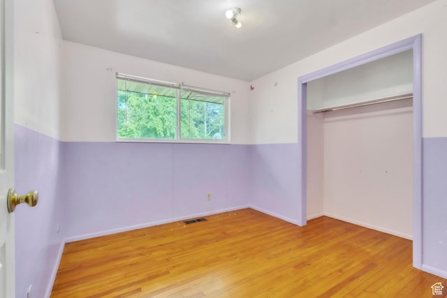 185 S 200 W, Providence, UT 84332 - unfurnished bedroom with wood finished floors and a closet