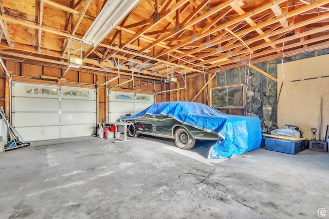 185 S 200 W, Providence, UT 84332 - garage featuring a garage door opener