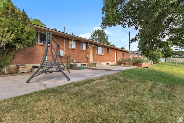 185 S 200 W, Providence, UT 84332 - rear view of property featuring brick siding and a patio area