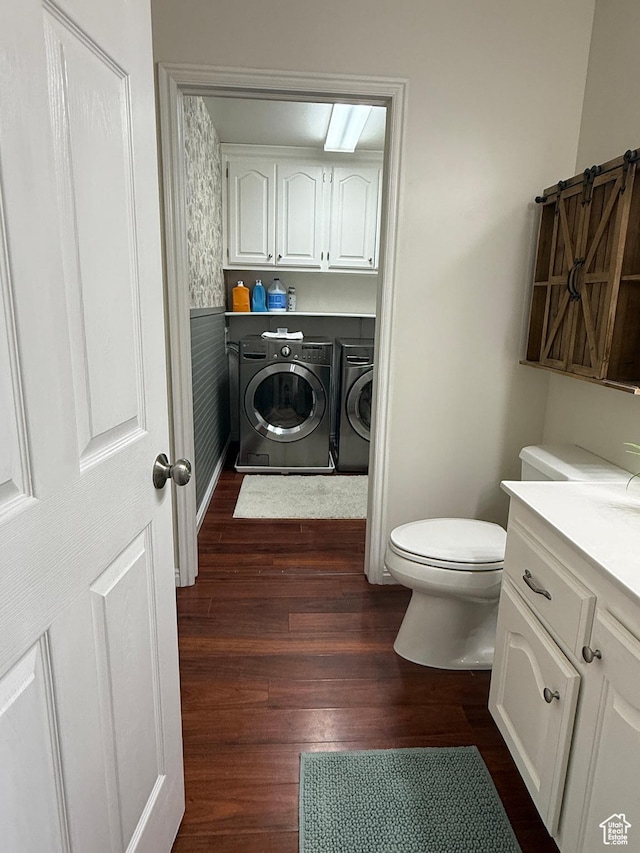 14048 S Van Cott Peak Cir W, Riverton, UT 84096 - bathroom with washing machine and dryer, vanity, and wood finished floors