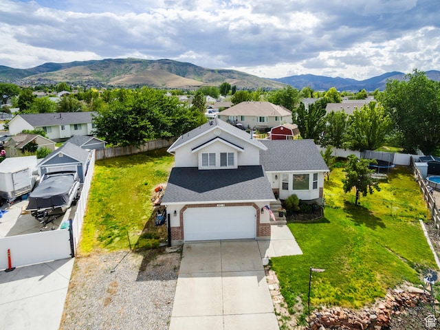 14048 S Van Cott Peak Cir W, Riverton, UT 84096 - aerial view of residential area with a mountain backdrop