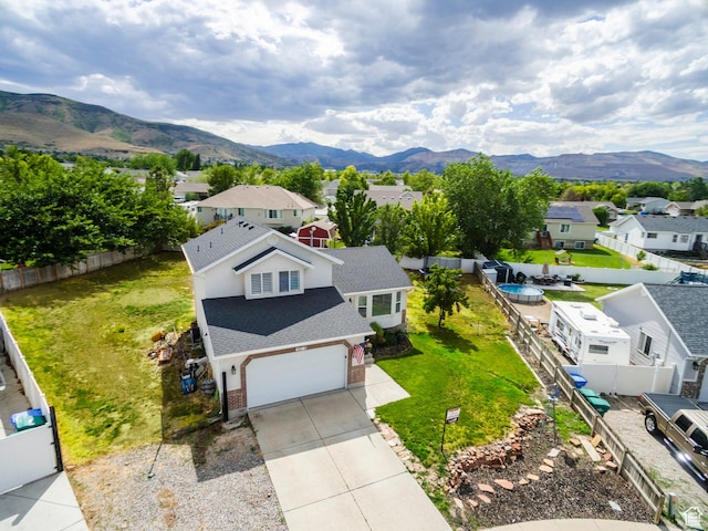 14048 S Van Cott Peak Cir W, Riverton, UT 84096 - aerial view of residential area with a mountain backdrop