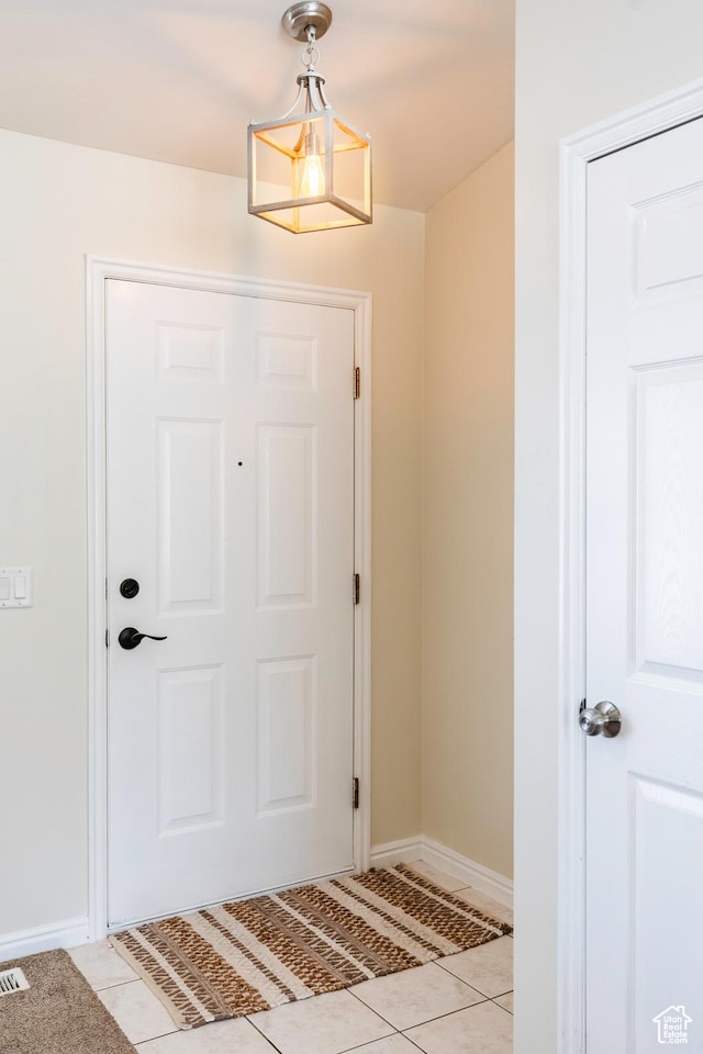 14048 S Van Cott Peak Cir W, Riverton, UT 84096 - foyer entrance with baseboards and light tile patterned floors