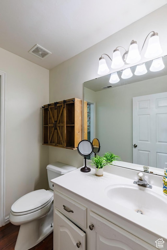 14048 S Van Cott Peak Cir W, Riverton, UT 84096 - bathroom featuring vanity and wood finished floors