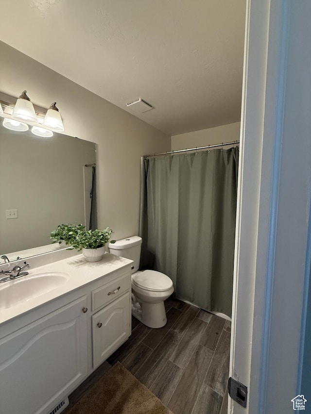 14048 S Van Cott Peak Cir W, Riverton, UT 84096 - bathroom with wood finish floors and vanity