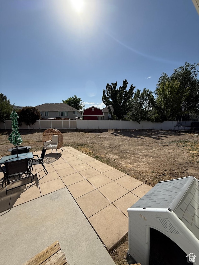 14048 S Van Cott Peak Cir W, Riverton, UT 84096 - fenced backyard featuring a patio area