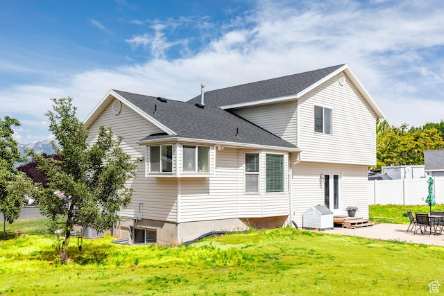 14048 S Van Cott Peak Cir W, Riverton, UT 84096 - rear view of property with a patio and a shingled roof