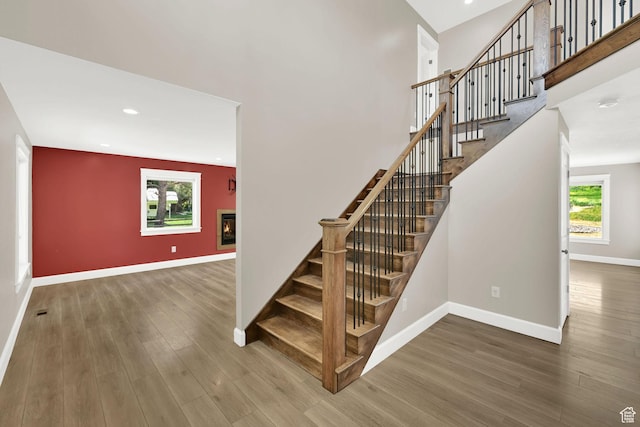 6699 E 950 S, Huntsville, UT 84317 - staircase with wood finished floors, healthy amount of natural light, recessed lighting, and a glass covered fireplace
