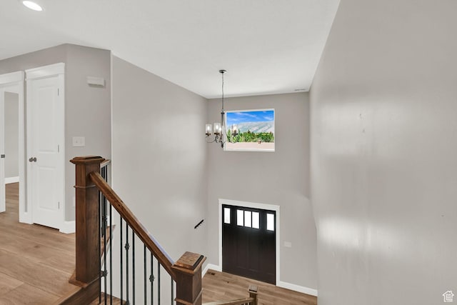 6699 E 950 S, Huntsville, UT 84317 - entrance foyer with light wood-type flooring and a chandelier