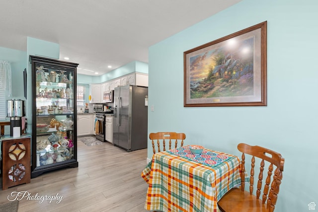 180 N 1100 E Unit 190, Washington, UT 84780 - dining space with light wood-style floors