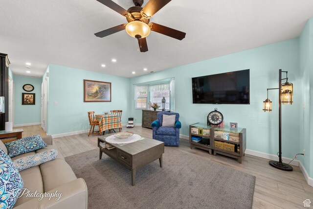 180 N 1100 E Unit 190, Washington, UT 84780 - living area with light wood-style flooring, ceiling fan, and recessed lighting
