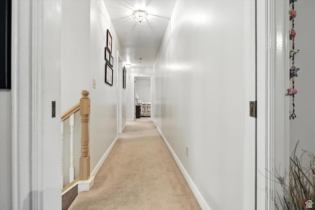 36 N Main St, Mantua, UT 84324 - corridor featuring light carpet and baseboards
