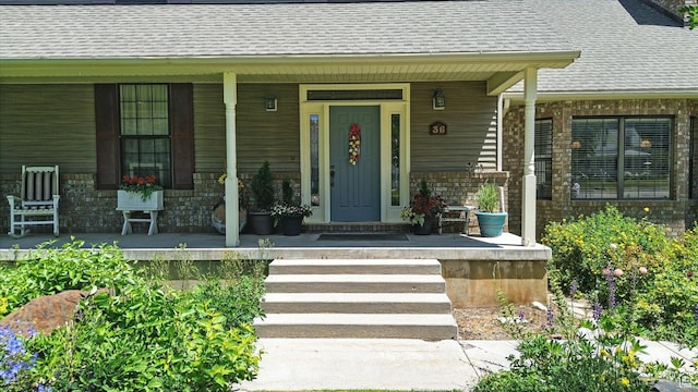 36 N Main St, Mantua, UT 84324 - view of exterior entry with covered porch and roof with shingles